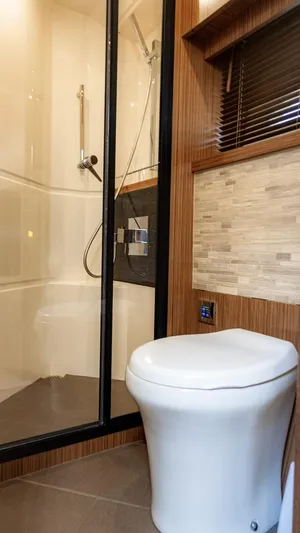  Yacht Photos Pics Luxurious bathroom in 2018 Sea Ray L590 yacht with modern shower and toilet.