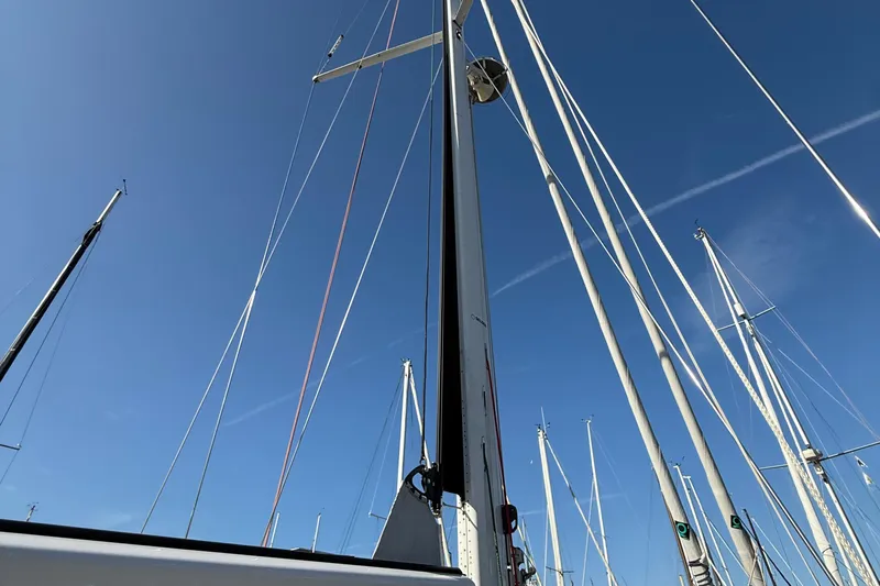 Pau Hana Yacht Photos Pics Sailboat masts against clear blue sky, Nautor Swan 54, 2019 model.