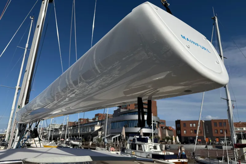 Pau Hana Yacht Photos Pics 2019 Nautor Swan 54 sailboat with Mainfurl system, docked in a marina.