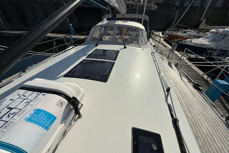 Pau Hana Yacht Photos Pics Nautor Swan 54 yacht deck, 2019 model, docked in a marina.