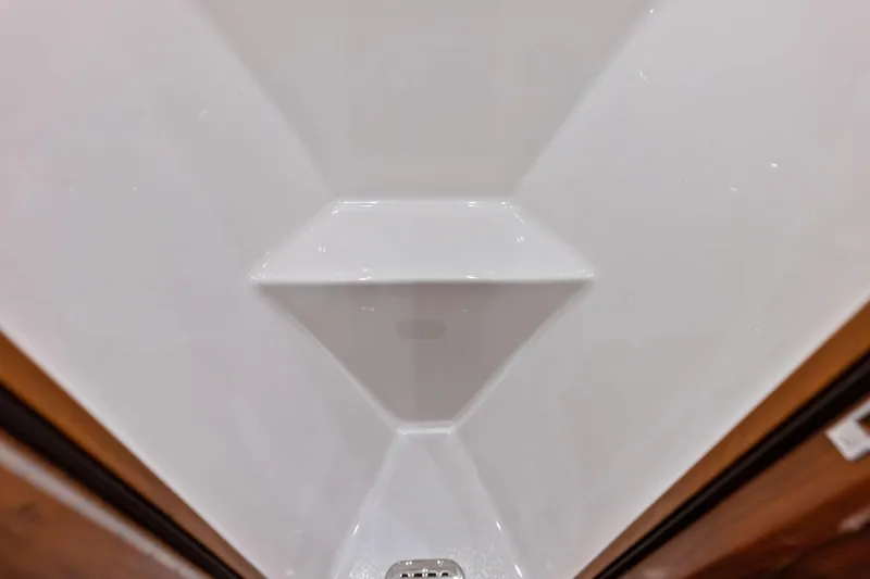 Knot Haulin Yacht Photos Pics 2017 Spencer Convertible interior, featuring a sleek white geometric design.