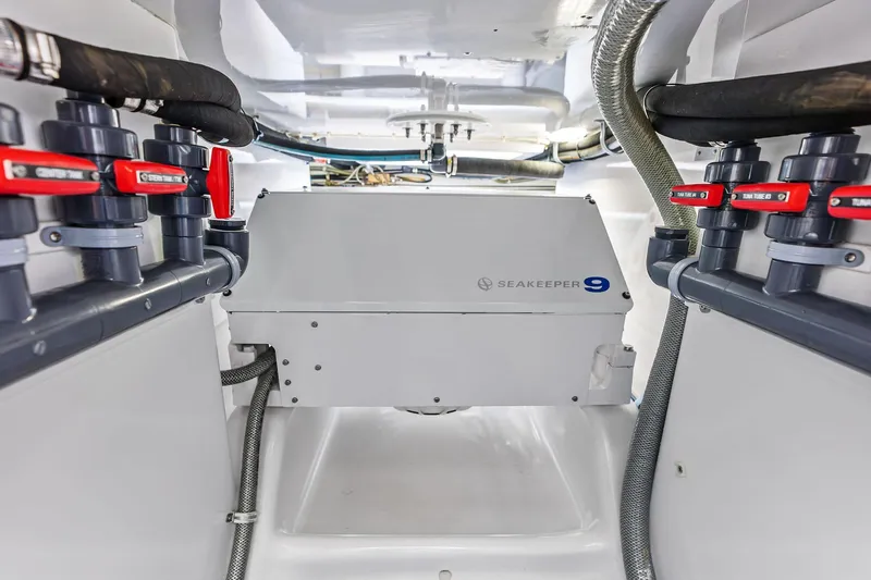 Knot Haulin Yacht Photos Pics Engine room of 2017 Spencer Convertible with Seakeeper 9 stabilizer system.