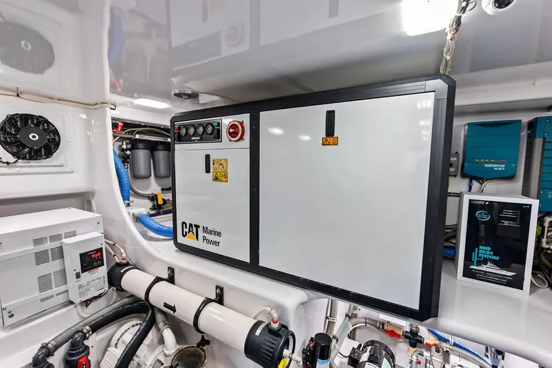 Knot Haulin Yacht Photos Pics Engine room of 2017 Spencer Convertible with CAT Marine Power system.