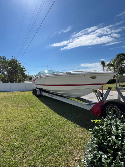  Yacht Photos Pics 2016 Formula 353 FASTech boat on trailer, parked on grass under a clear blue sky.