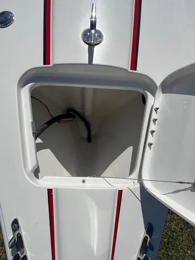  Yacht Photos Pics 2016 Formula 353 FASTech boat storage compartment with red stripes.