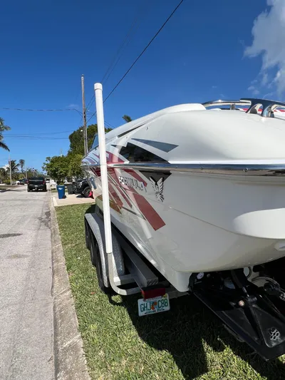  Yacht Photos Pics 2016 Formula 353 FASTech boat on trailer, parked on a sunny street.