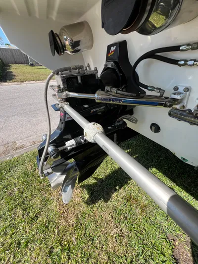  Yacht Photos Pics Close-up of 2016 Formula 353 FASTech boat engine components on grass.