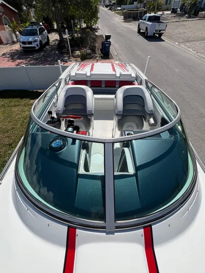  Yacht Photos Pics 2016 Formula 353 FASTech boat with sleek design and red accents, parked on a street.