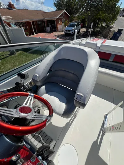  Yacht Photos Pics 2016 Formula 353 FASTech boat interior with red steering wheel and gray seating.