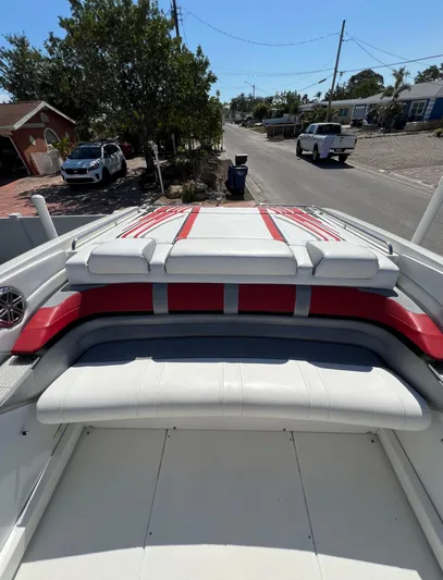  Yacht Photos Pics 2016 Formula 353 FASTech boat with red and white seating, parked on a residential street.
