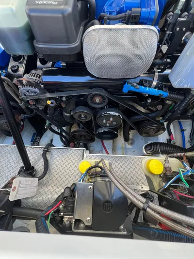  Yacht Photos Pics Engine compartment of a 2016 Formula 353 FASTech boat, showcasing mechanical components.