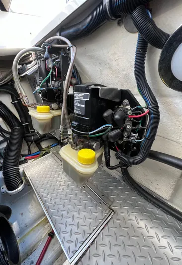  Yacht Photos Pics Engine compartment of a 2016 Formula 353 FASTech with wiring and fluid reservoirs.