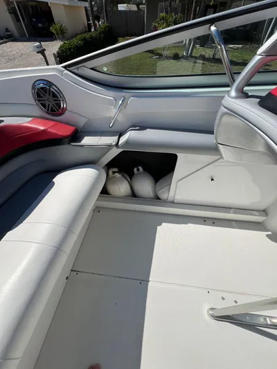  Yacht Photos Pics 2016 Formula 353 FASTech boat interior with white seating and storage compartment.
