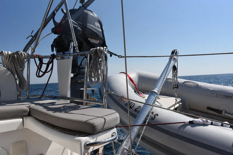 Recovery Room Yacht Photos Pics Jeanneau 51 sailboat deck with dinghy and ocean view, 2019 model.
