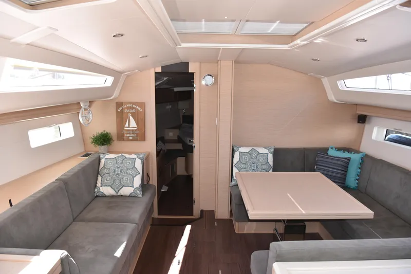 Recovery Room Yacht Photos Pics Luxurious interior of 2019 Jeanneau 51 yacht with modern seating and decor.