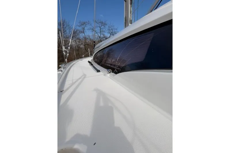 Recovery Room Yacht Photos Pics 2019 Jeanneau 51 sailboat deck with sleek design and clear blue sky.