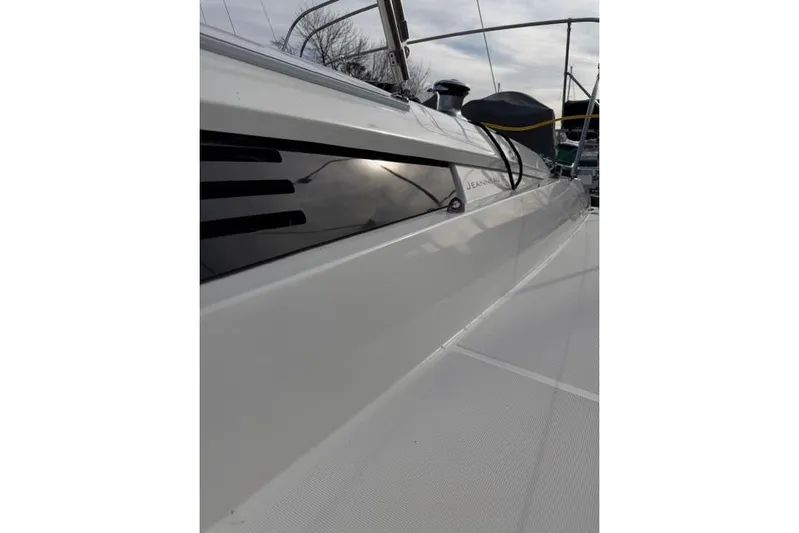 Recovery Room Yacht Photos Pics 2019 Jeanneau 51 sailboat deck, showcasing sleek design and modern features.