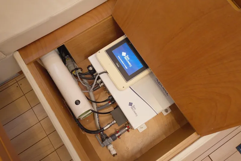 Miss Fiona Yacht Photos Pics Jeanneau 64 yacht 2020, Sea Recovery system installed in wooden compartment.