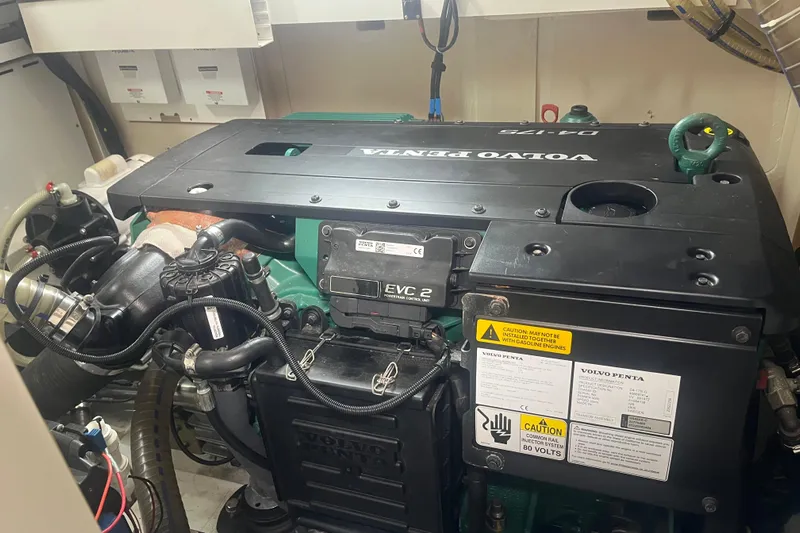 Miss Fiona Yacht Photos Pics Engine room of a 2020 Jeanneau 64 yacht featuring a Volvo Penta engine.