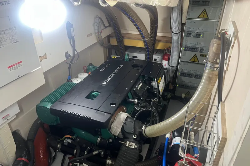 Miss Fiona Yacht Photos Pics Engine room of a 2020 Jeanneau 64 yacht featuring a Volvo Penta engine.