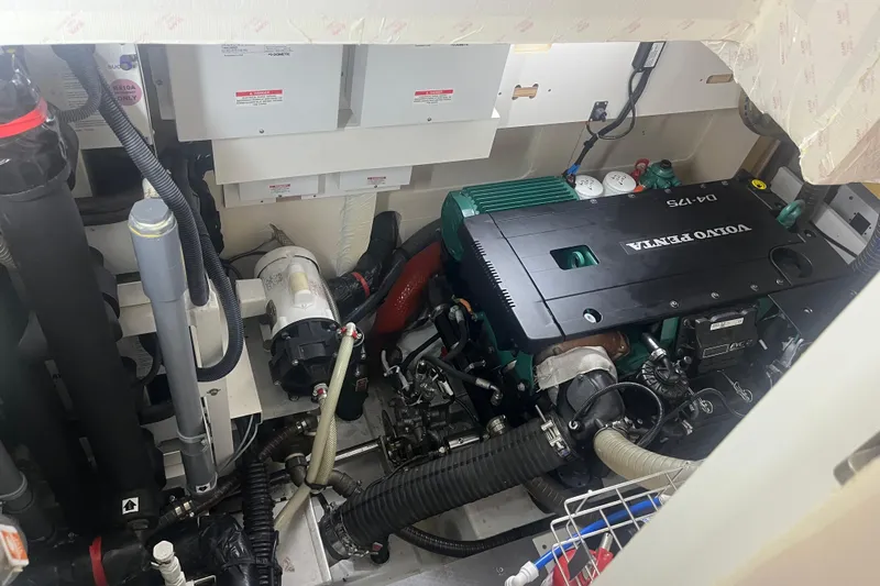 Miss Fiona Yacht Photos Pics Engine room of a 2020 Jeanneau 64 yacht featuring a Volvo Penta engine.