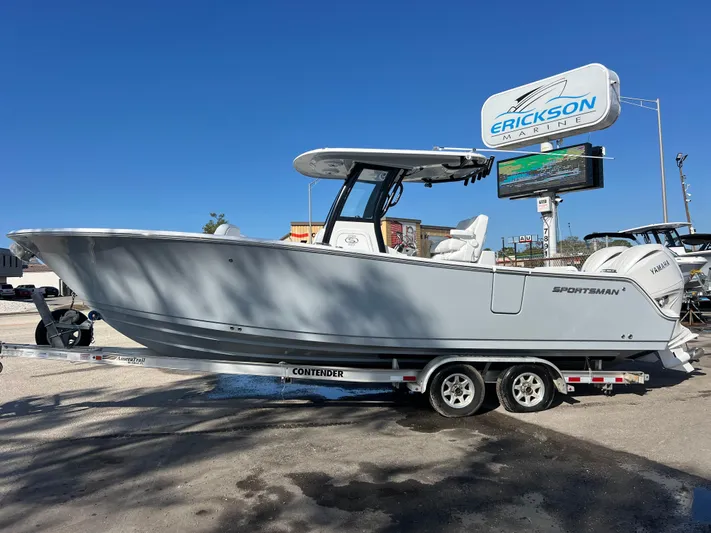  Yacht Photos Pics 2025 Sportsman Open 262 Center Console boat on trailer at dealership.