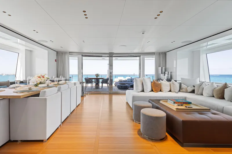 Contigo Yacht Photos Pics Luxurious interior of 2024 Benetti Oasis 40M yacht with ocean view and elegant furnishings.