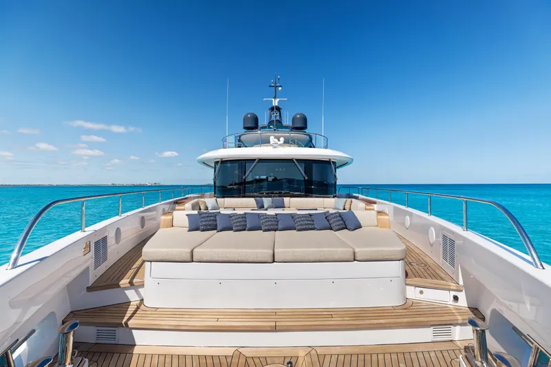 Contigo Yacht Photos Pics Luxurious 2024 Benetti Oasis 40M yacht with spacious deck and ocean view.