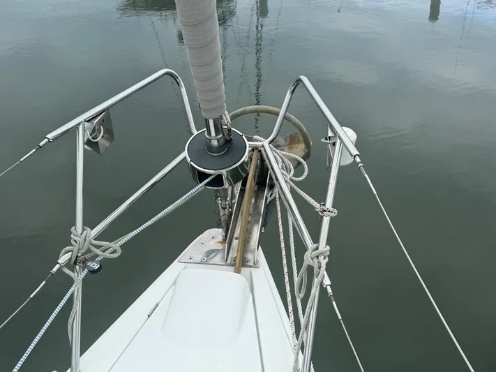 Kaleidoscope Yacht Photos Pics Bow of 2004 Beneteau First 47.7 sailboat with anchor and ropes.