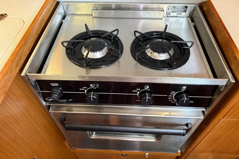 Magic Yacht Photos Pics Stainless steel two-burner stove in a 2011 Catalina 355 yacht kitchen.