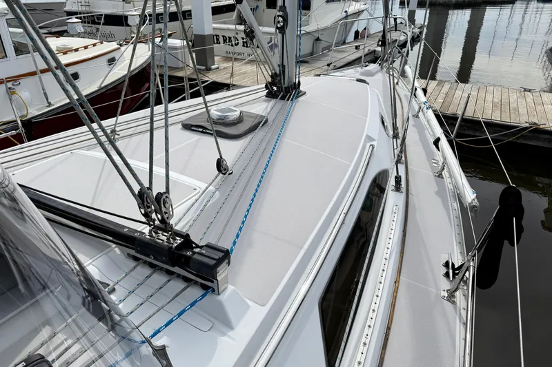 Magic Yacht Photos Pics 2011 Catalina 355 sailboat deck with rigging at marina dock.