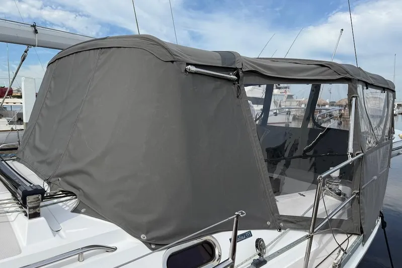 Magic Yacht Photos Pics 2011 Catalina 355 sailboat with gray canvas cover at marina.