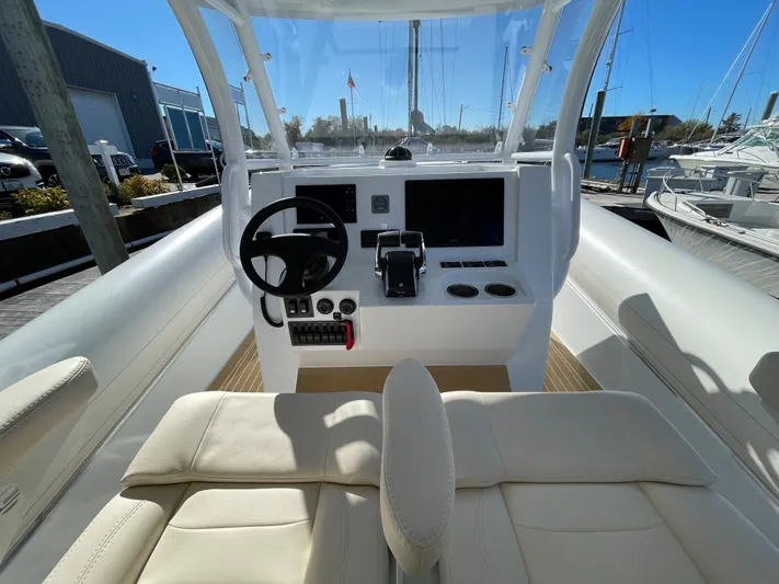  Yacht Photos Pics 2022 Sea Blade 36 R boat cockpit with modern controls and comfortable seating.