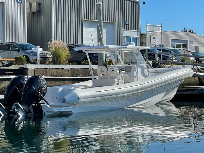  Yacht Photos Pics 2022 Sea Blade 36 R boat docked at marina with twin outboard engines.