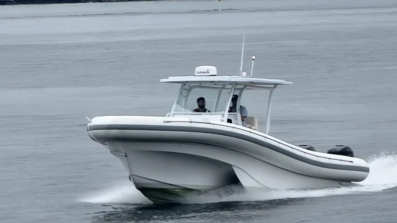  Yacht Photos Pics 2022 Sea Blade 36 R boat cruising on water.