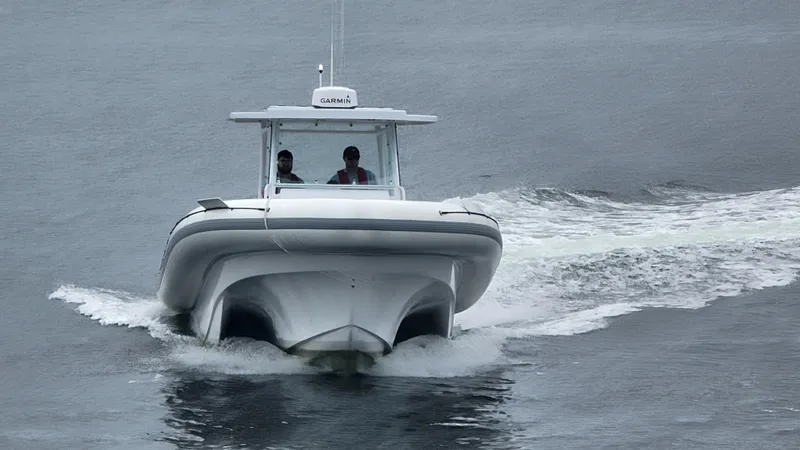  Yacht Photos Pics 2022 Sea Blade 36 R boat cruising on water.