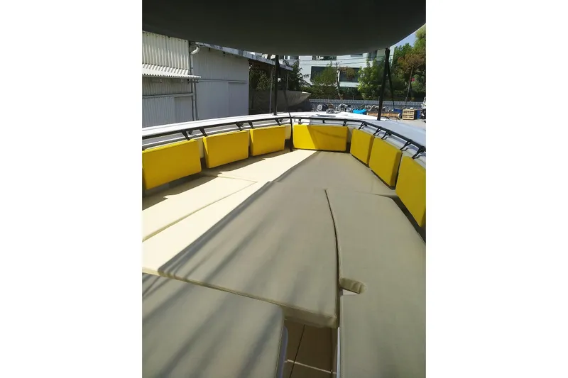 4play Yacht Photos Pics 2013 Fountain 38 Sportfish CC Open Bow with yellow seating and spacious deck.