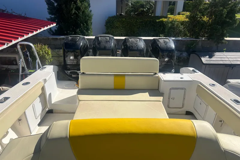 4play Yacht Photos Pics 2013 Fountain 38 Sportfish CC Open Bow with four outboard engines, yellow and white seating.