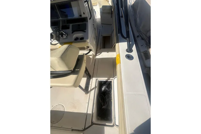 4play Yacht Photos Pics 2013 Fountain 38 Sportfish CC Open Bow interior with seating and storage compartments.
