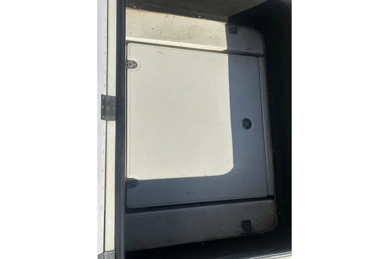 4play Yacht Photos Pics 2013 Fountain 38 Sportfish CC Open Bow storage compartment, closed lid view.