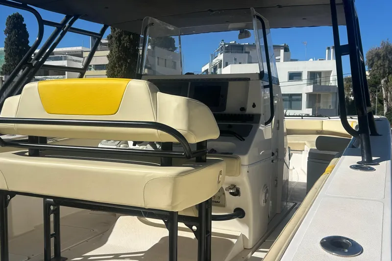 4play Yacht Photos Pics 2013 Fountain 38 Sportfish CC Open Bow boat interior with seating and console.