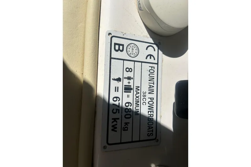 4play Yacht Photos Pics 2013 Fountain 38 Sportfish CC Open Bow capacity plate, showing specifications and maximum load.