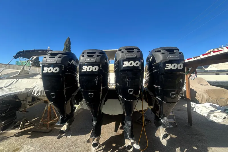 4play Yacht Photos Pics 2013 Fountain 38 Sportfish CC Open Bow with four powerful outboard engines.