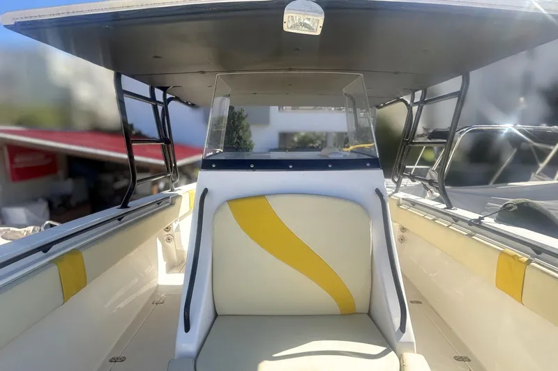 4play Yacht Photos Pics 2013 Fountain 38 Sportfish CC Open Bow with yellow-accented seating and T-top.