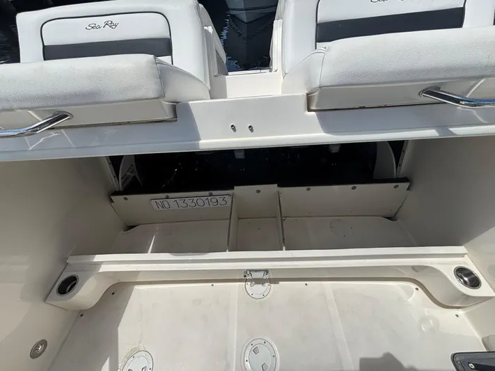  Yacht Photos Pics 2014 Sea Ray 300 SLX boat interior with seating and storage compartments.