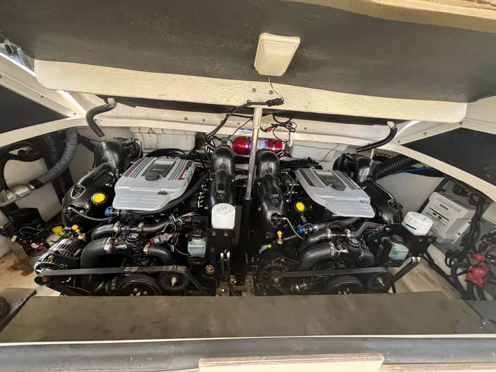  Yacht Photos Pics 2014 Sea Ray 300 SLX engine compartment with dual engines and mechanical components.