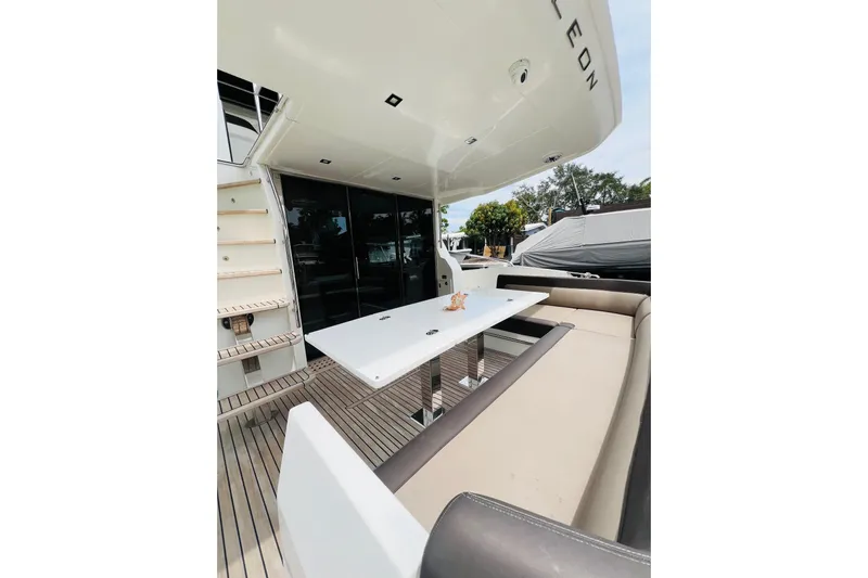 Bugsy Yacht Photos Pics Luxury seating area on 2020 Galeon 550 Fly yacht with sleek design and modern amenities.