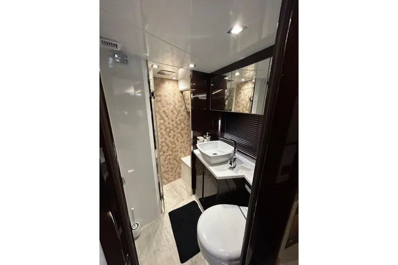 Bugsy Yacht Photos Pics Luxurious bathroom in 2020 Galeon 550 Fly yacht with modern fixtures and elegant design.