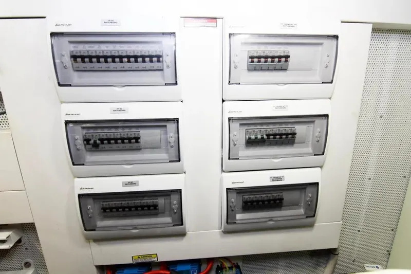 Bugsy Yacht Photos Pics Electrical panel on 2020 Galeon 550 Fly yacht, featuring multiple circuit breakers.