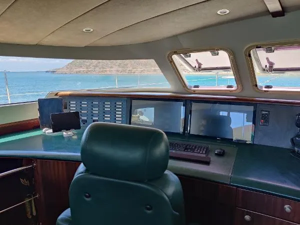  Yacht Photos Pics Interior view of 1997 Fountaine Pajot Marquises 56 yacht with ocean backdrop.